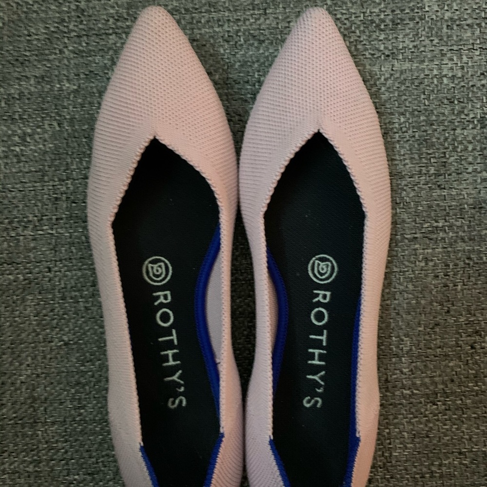 Rothy’s pink business show with pointed toes.